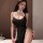 Seductive nun costume set featuring a black lace-trimmed dress with sheer mesh skirt, perfect for cosplay and adult entertain...