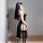 Woman in seductive nun costume lingerie with lace trim, open back design, and thigh-high stockings for role play.