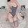 Seductive open-crotch bodysuit set featuring sexy lingerie sleepwear with a tempting pure allure design, showcased on a model...
