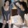 Woman wearing a seductive open-crotch bodysuit in ice silk, featuring tight-fitting design and heart-shaped detail, perfect f...