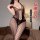 Seductive plus size lace bodysuit with sheer mesh panels and thigh-high black stockings, featuring an open-crotch design for ...