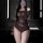 Woman in brown sheer mesh lingerie set taking mirror selfie, featuring lace details and off-shoulder design for plus size cur...
