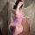 Woman wearing seductive purple fishnet bodystocking, sheer mesh full body stocking for women, plus size & busty friendly desi...