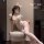 Woman in white lace qipao lingerie with bunny ears, sitting on ottoman. seductive qipao lingerie set - forbidden elegance sle...