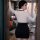 Woman in white blouse and black bodycon skirt, showcasing the seductive secretary costume set with deep v-neck and no-remove ...