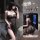 Woman wearing a seductive sheer lace sleep dress with underwire support and floral accents, posing elegantly in a dimly lit r...