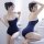 Woman modeling navy blue sheer milk silk bodysuit, tight-fit one-piece lingerie with white trim, posing in bathroom setting.