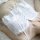 White lace bodysuit and camisole set with delicate straps, elegant sleepwear for sophisticated style.