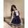 A stylish navy schoolgirl dress with white trim and bow detail, perfect for a cute and sexy look.