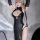 Elegant black leather look bodysuit with deep cut and thigh slit, featuring sensual design inspired by traditional qipao styl...