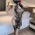 Sensual chinese-inspired sheer high-slit modern qipao set featuring floral lace details and ink wash design, perfect for eleg...