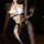 Sensual egyptian cat lady costume with hollow-out halter gown, featuring chains and a bold centerpiece for cosplay.