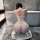 Woman kneeling in bathroom wearing sensual full-body mesh bodystocking with open-crotch design – sexy seamless sheer lingerie...