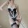 Sensual lace bodysuit featuring delicate floral designs, perfect for a flirty bedroom outfit. ideal sleepwear with feminine e...