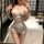 Sensual lace bodysuit featuring open-crotch design, sheer mesh cutouts, and delicate lace details for an elegant look.