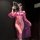 Woman in purple sheer mesh robe and lace lingerie set with high-end stockings, holding a feather fan.