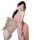 Woman wearing pink sensual lace mesh slip dress, elegant nightgown with floral hair accessory and soft pillows.