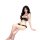Woman wearing black lace sleep set with matching bralette and panties, featuring delicate pink bows for a sensual bedroom loo...