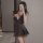 Woman in black lace nightgown with floral details, taking mirror selfie. sensual sleepwear set for women – youthful, pure, an...