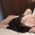 Woman wearing black lace-trimmed mesh slip dress, sensual sheer sleepwear set for women, no-remove lingerie style.