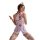 Woman in white nurse costume with red trim, deep v cutout, heart-shaped belt, fishnet stockings, and stethoscope.