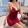 Woman in red lace chemise with pearl chains, holding wine glass by bathtub. sensual pearl-chain lace chemise – sexy qqny slee...