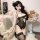Sensual sheer lace bodysuit with open-crotch design, featuring delicate lace details and stockings, perfect for pure temptati...