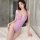 Woman wearing sensual sheer lace bodysuit swimwear, open-crotch one-piece mesh tankini set for adults, in a modern bathroom s...
