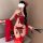 Woman modeling red embroidered doudou set with lace-up bodice, sheer panties, and matching thigh-highs.