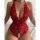 Woman wearing a red lace halter bodysuit with open crotch and backless design.