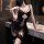 Sexy beaded lace bodysuit for women featuring sheer mesh skirt, open-crotch design, and no-remove style, perfect for elegant ...