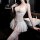 Sexy beaded lace bodysuit for women featuring sheer mesh skirt, open-crotch design, and no-remove style, perfect for elegant ...