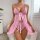 Woman wearing pink floral mesh nightgown with front tie, sheer robe, and matching lingerie set in soft bedroom setting.