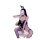 Woman in black bunny girl lingerie set with open-crotch bodysuit, fishnet stockings, and bunny ears headband.