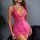 Woman modeling a vibrant pink deep v backless lace lingerie set with bow details, showcasing the premium bodycon chemise desi...