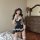 Woman wearing black and white lace maid costume sleep dress with deep v neckline, plus size temptation outfit, no-remove desi...