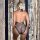 Sexy -style halter neck lingerie set – shiny mesh backless bodysuit for nightclub & stage wear, featuring a halter neck desi...