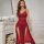 Elegant red lace dress featuring a deep v-neckline and side slit, perfect for a luxurious loungewear look.