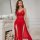 Elegant red lace dress featuring a deep v-neckline and side slit, perfect for a secretary style lounge look.