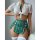 Sexy style passion lingerie set featuring a plaid mini skirt, sheer top with tie-front design, and thigh-high stockings for...
