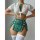 Sexy style passion lingerie set featuring a plaid mini skirt, sheer top with tie-front design, and thigh-high stockings for...