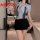 Woman wearing a sexy female police officer costume with a tight white shirt and black skirt, ideal for role play, cosplay, or...