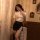 Sexy female police uniform costume set featuring a white blouse with gold buttons and a black mini skirt, perfect for role pl...