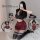 Woman modeling sexy jk style lingerie set with red plaid skirt, black crop top, and thigh-high socks in school uniform inspir...