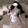 Woman in sexy lace bodysuit with deep v-neck, white skirt, and open-front secretary-style uniform for seductive sleepwear loo...