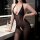 Woman in black sheer mesh bodysuit with halter neck and open crotch, posing in bathroom. plus size sexy lace outfit for women...
