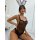 Woman wearing sexy lace bodysuit with polka dots and sheer mesh, featuring bunny ears—perfect costume outfit for women.
