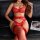 Woman in red lace bodysuit and fishnet stockings, elegant erotic lingerie set for intimate nights.