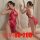 Woman modeling red lace bodysuit with sheer cheongsam design, featuring vintage-inspired cutouts and delicate floral patterns...