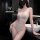 Woman wearing white lace bodysuit with sheer cut-outs, posing in bathroom. seductive lingerie set for adults.